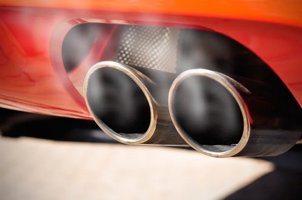 depositphotos 33465699 stock photo smoky exhaust pipe